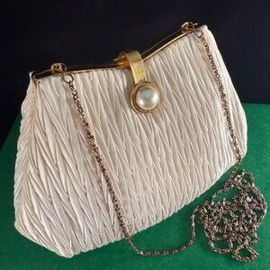Gorgeous gently worn cream evening bag.
